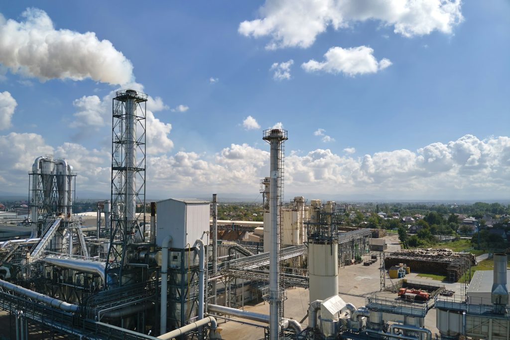 Aerial view of oil and gas refining petrochemical factory with high refinery plant manufacture